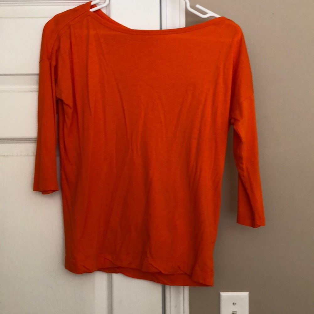 Bright orange top!